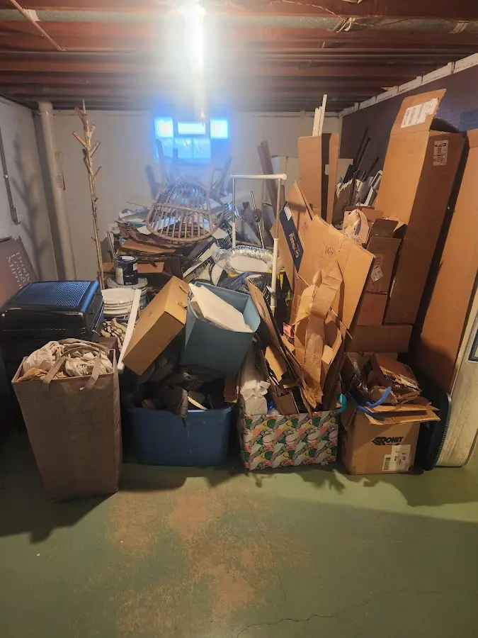 Roll-off dumpster container at job site for 2 Yard Dumpster Rental in Wiscasset